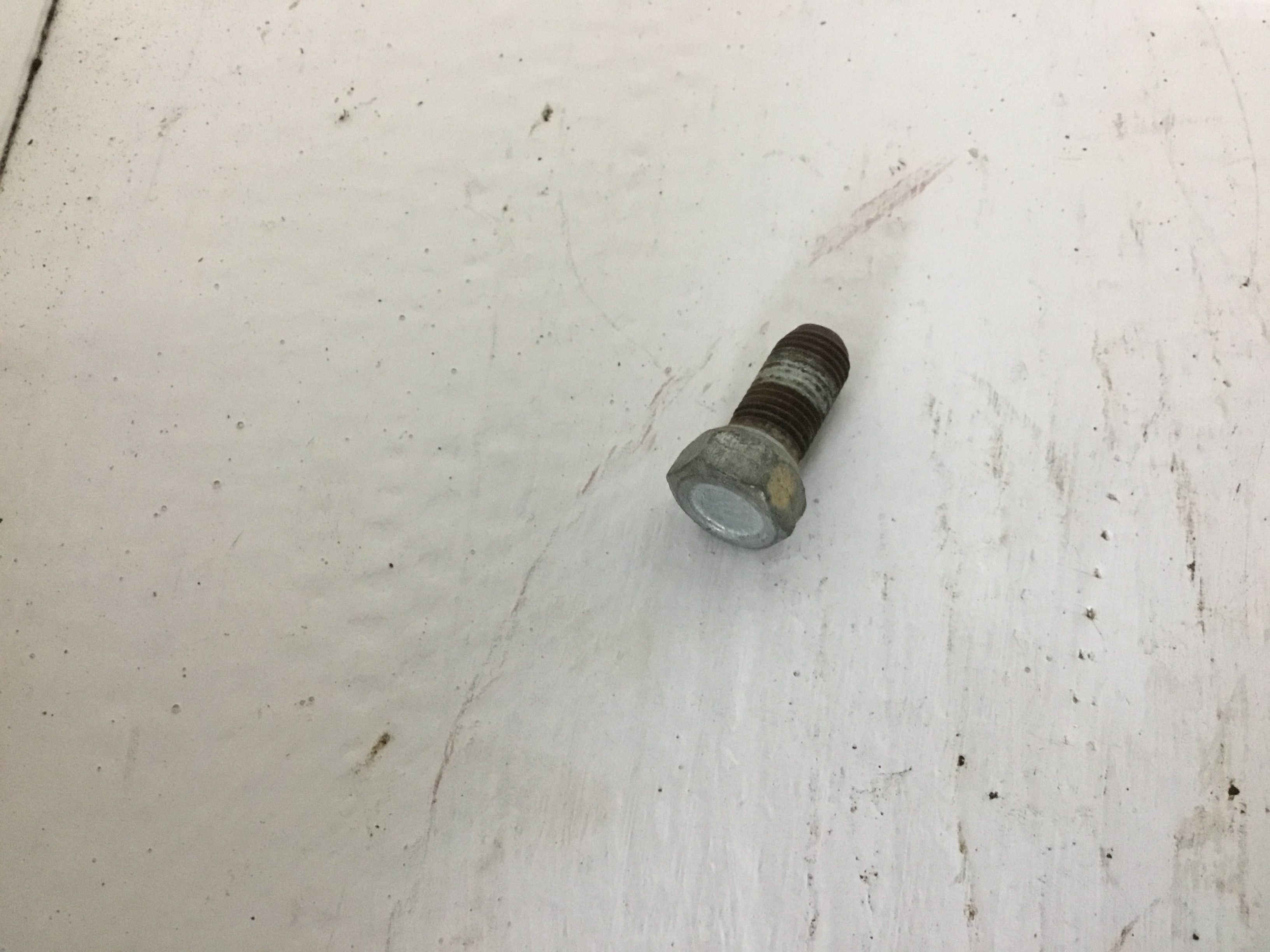 Lug bolt this is the older style with the design in the end of the lug head