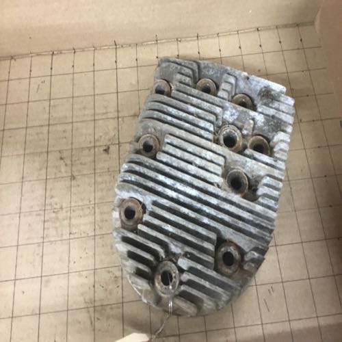 Cylinder head with spark plug off center