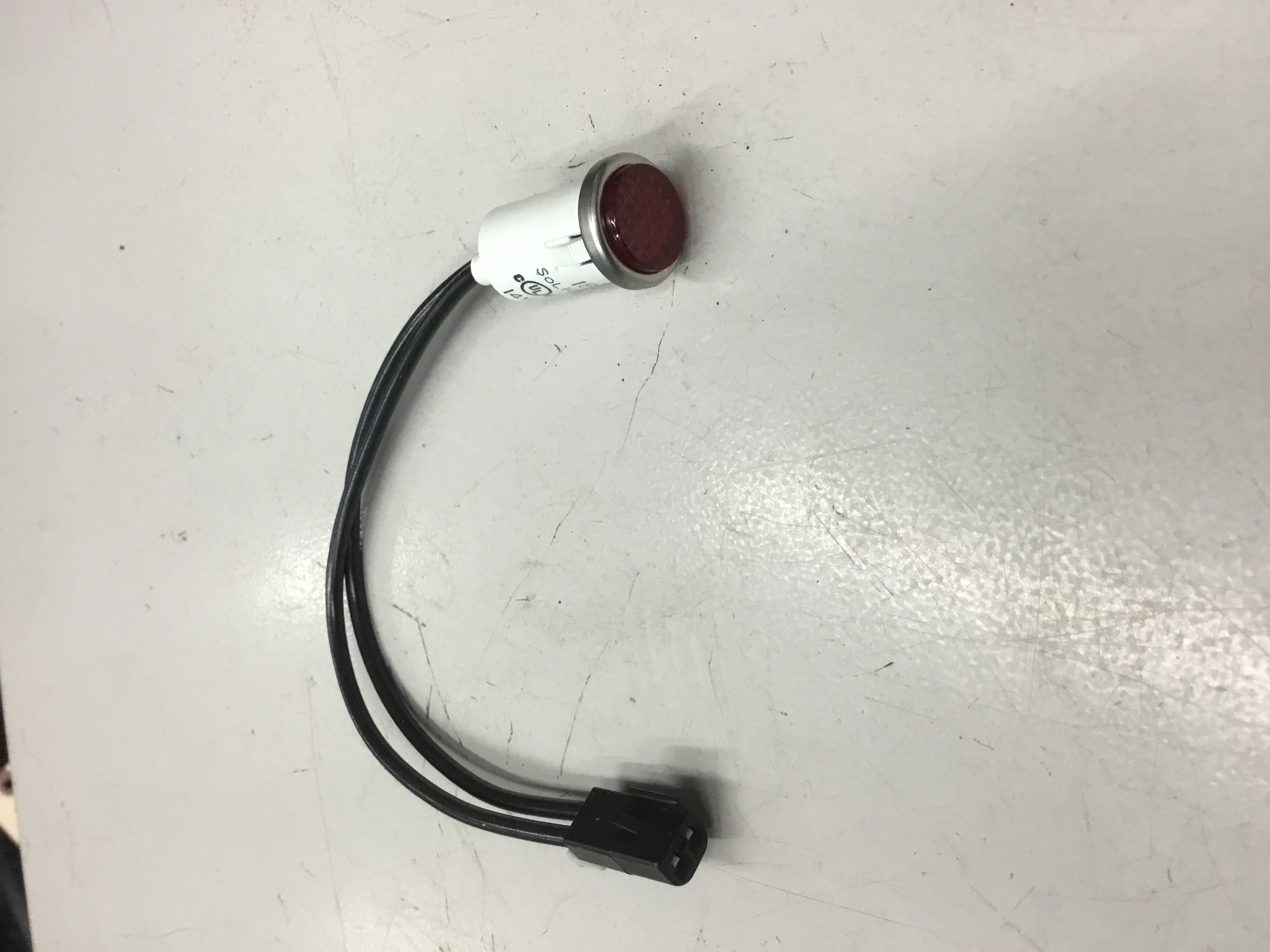 Indicator light assembly with chrome bezel